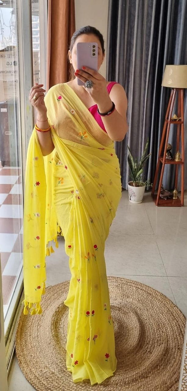Yellow mul mul cotton sarees with multi color embroidery