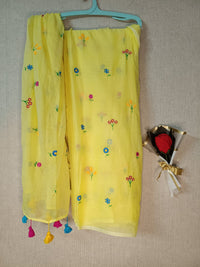 Yellow mul mul cotton sarees with multi color embroidery
