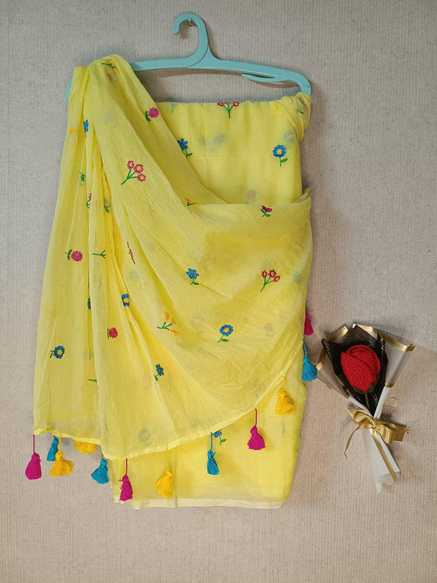 Yellow mul mul cotton sarees with multi color embroidery