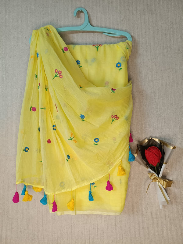 Yellow mul mul cotton sarees with multi color embroidery