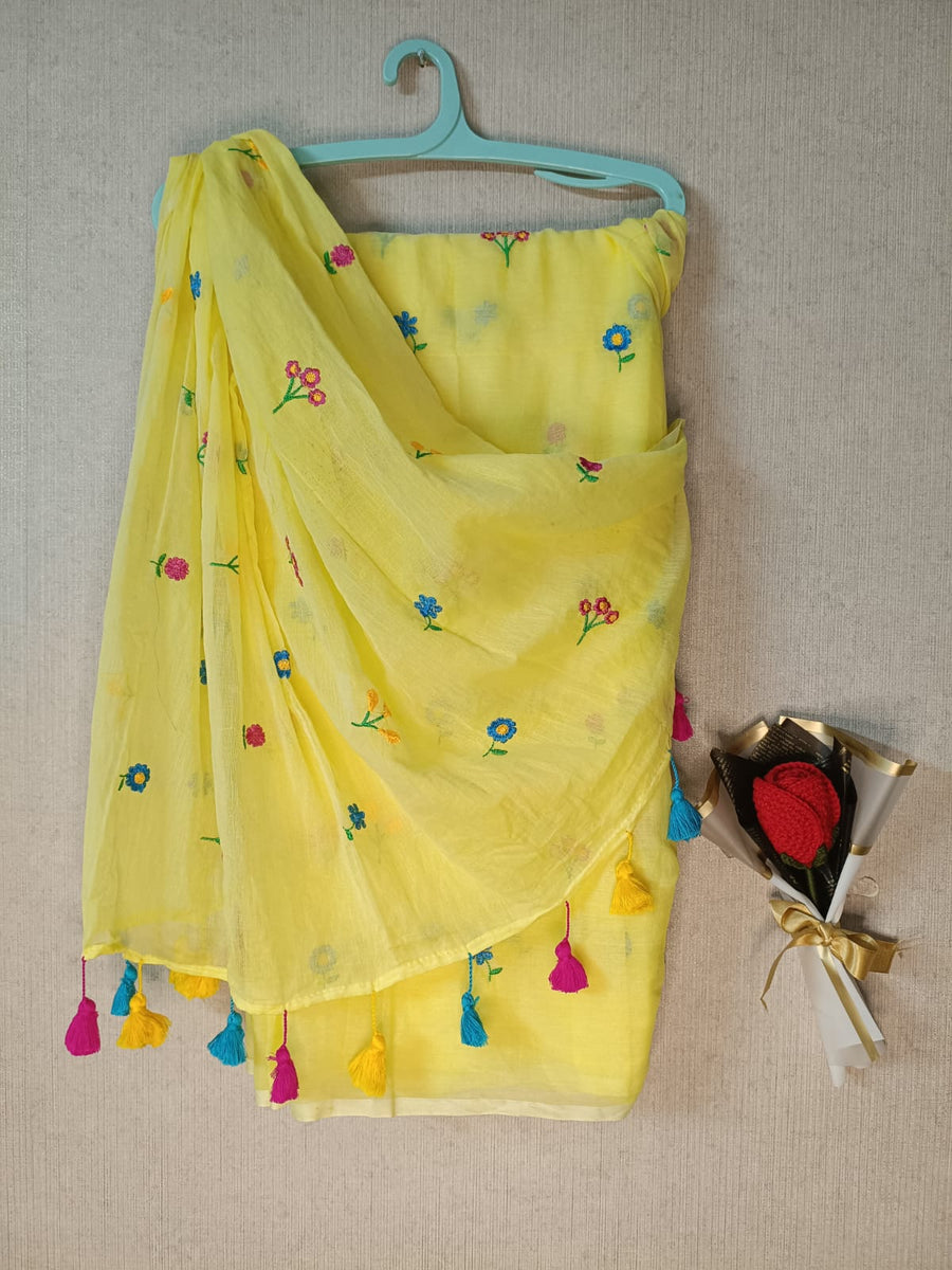 Yellow mul mul cotton sarees with multi color embroidery